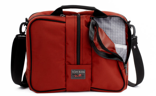 Pilot in Mars Red 525 Ballistic with Northwest Sky (light grey with white grid) 200 Halcyon interior.